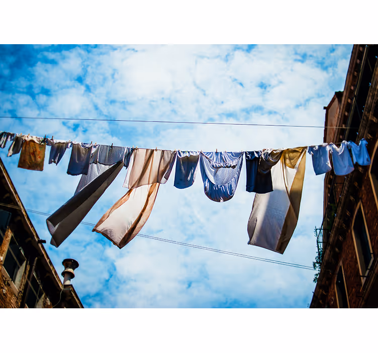 Clothes Line Breeze wall mural city - TenStickers