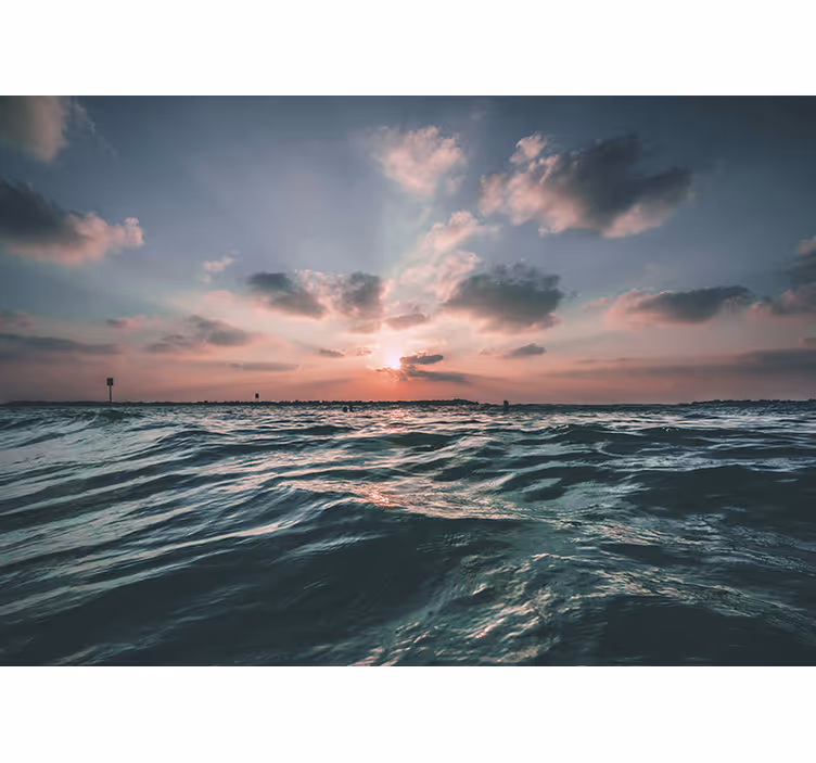 Sea wall mural sunset over waves - TenStickers