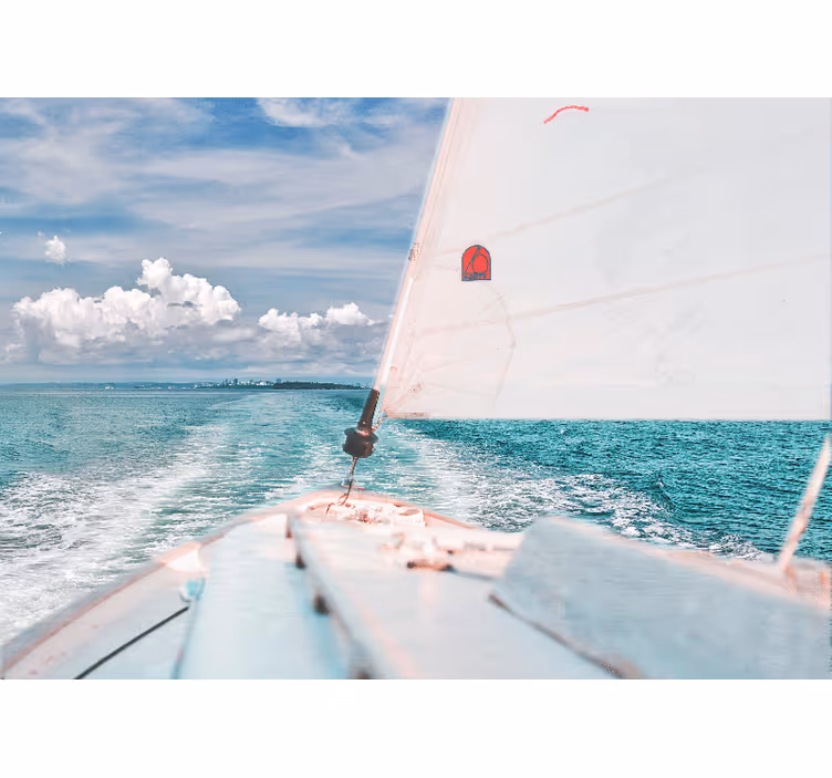 Sea wall mural sailing through waves - TenStickers