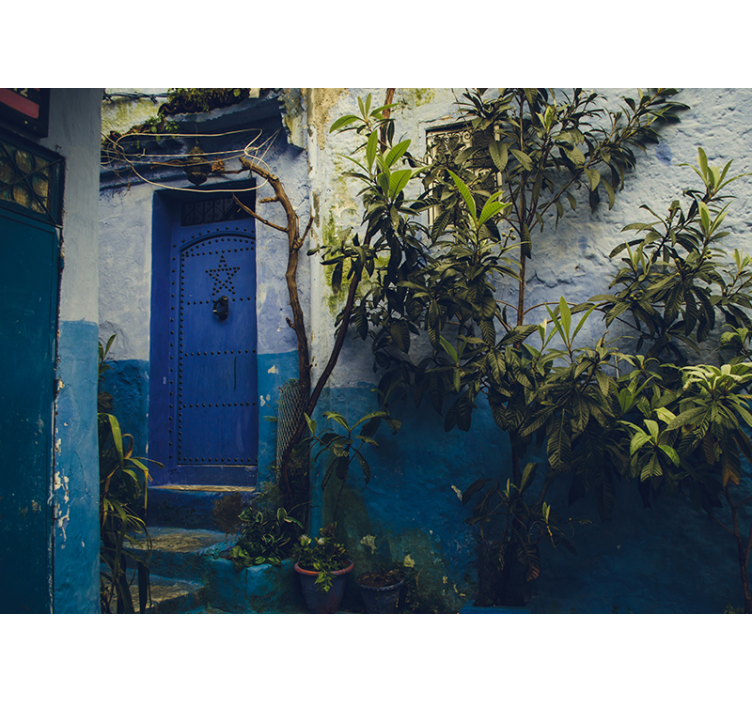 Wall mural city charming blue door - TenStickers