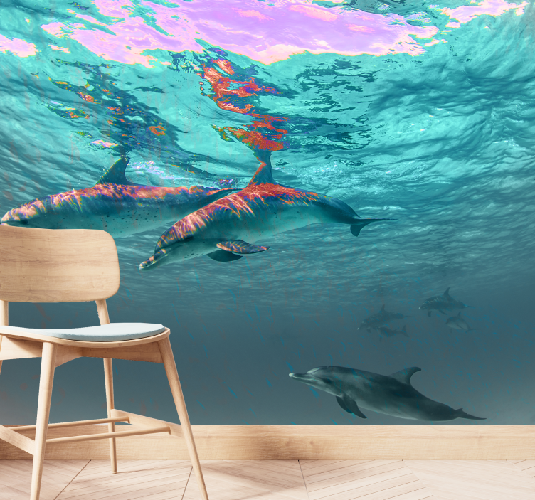 Wall mural animals dolphins swimming playfully - TenStickers