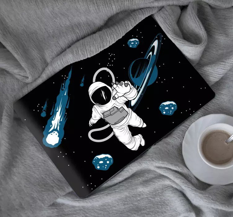 Laptop sticker astronaut floating in the cosmos - TenStickers