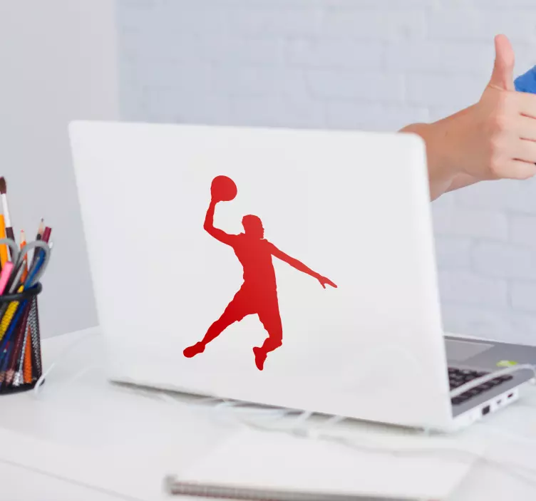 Basketball player silhouette laptop sticker - TenStickers